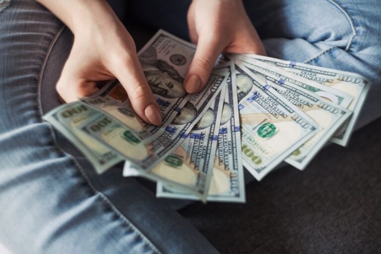 Personal finance ebook with currency notes